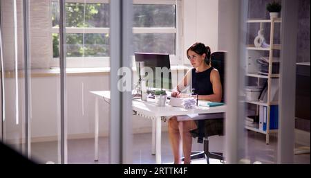 Happy Business Employee Desktop On Computer In Office Stock Photo