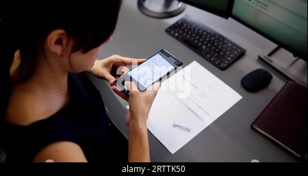 Taking Document Picture Or Photo With Phone. Smartphone Optical Document Stock Photo