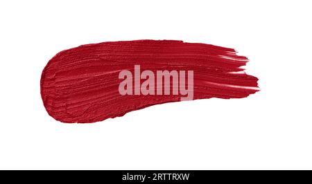 Red lipstick swatch isolated on white background. Brush stroke of lipstick or wet eye shadow for design. Stock Photo