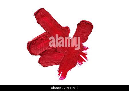 Red lipstick swatch isolated on white background. Brush stroke of lipstick or wet eye shadow for design. Stock Photo