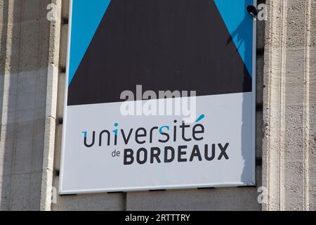 Bordeaux , France - 09 12 2023 : Bordeaux University historical building with flag logo brand and sign text front wall facade historic ancient school Stock Photo