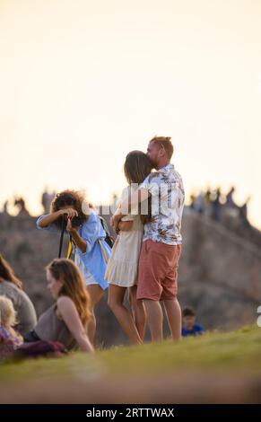 Galle, Sri Lanka - 03 31 2022: Photographer and the beautiful couple, photo session in the evening. Stock Photo