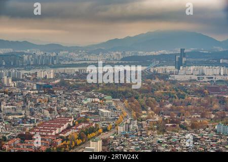 Seoul South Korea, city skyline at Seoul city center and Han River view from Namsan Mountain in autumn Stock Photo