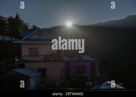 November 30th 2022. Tehri Garhwal, Uttarakhand India. Mountain homestays in Uttarakhand with the sun rising over the Himalayan ridge, showcasing Himal Stock Photo