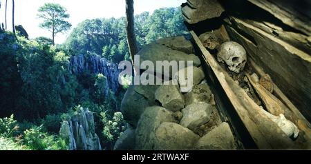 Ancient coffin hidden in cliff face Stock Photo