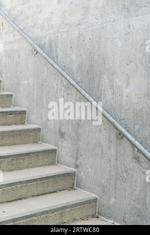 A minimalist grey cement staircase Stock Photo