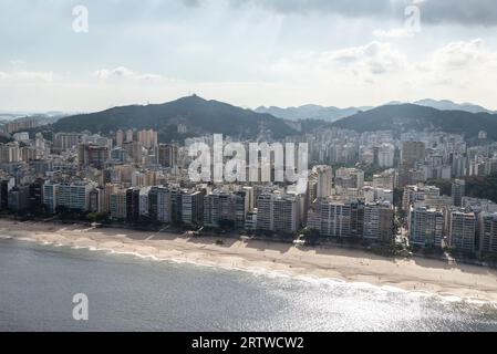 Beautiful aerial view to ocean beach and city buildings in Rio Stock Photo