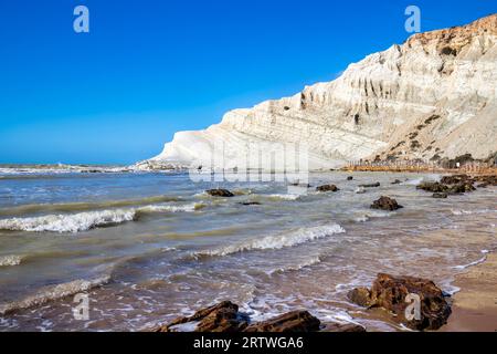 View of the limestone white cliffs with the beach at Stair of the Turks or Turkish Steps near Realmonte in Agrigento province. Sicily, Italy Stock Photo