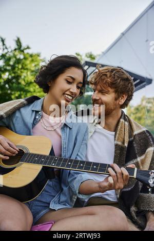 Joyful Asian Boyfriend And Girlfriend Playing Video Game At Home