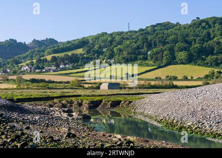 The Breach in the pebble ridge along Porlock Bay which has led to the transformation of the Porlock Marsh into a salt marsh, Exmoor National Park, Somerset, England. Stock Photo