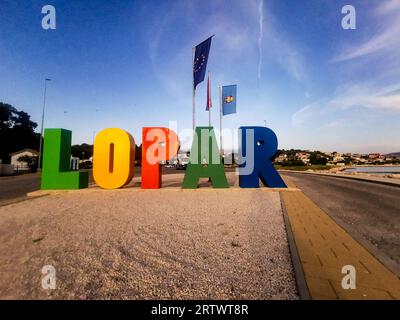 Colorful inscription in the city of Lopar welcoming travelers in Croatia Stock Photo