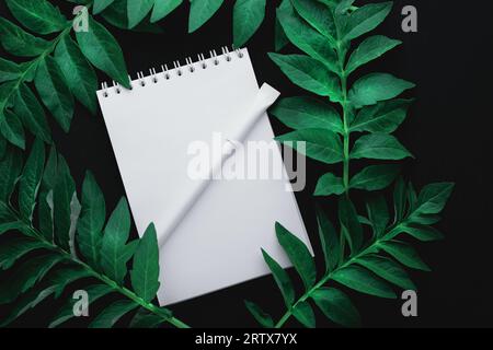 notebook with goals on black table, flat lay style Stock Photo