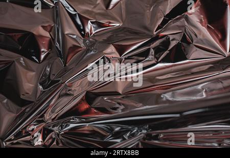 Silver foil background with shiny crumpled surface for texture background Stock Photo