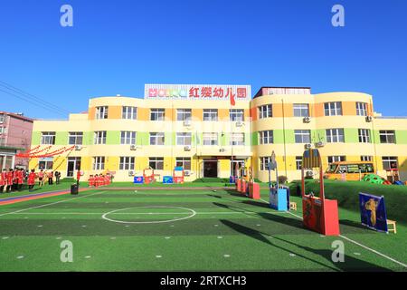 LUANNAN COUNTY, China - December 31, 2021: architectural appearance of a private kindergarten, North China Stock Photo