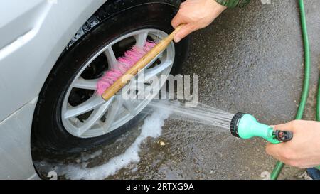 Outdoor Car Wash With Active Foam Soap. Commercial Cleaning