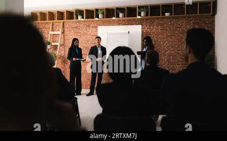 Multiracial business people working inside conference room - Team of diverse creative entrepreneurs doing meeting work Stock Photo