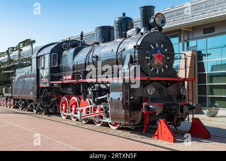 SAINT PETERSBURG, RUSSIA - AUGUST 27, 2023: Soviet steam locomotive of the 'Em' series in the Russian Railway Museum on a sunny day Stock Photo