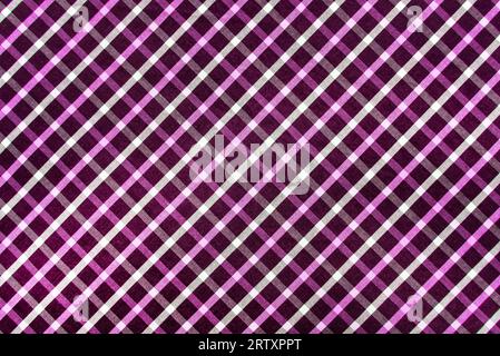 The texture of linen fabric in a large cage of purple, red  and white. Scottish tailoring material. Checkered fabric Stock Photo