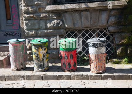 Painted dust bins in historic part of Veliko Tarnovo town in north central Bulgaria Stock Photo