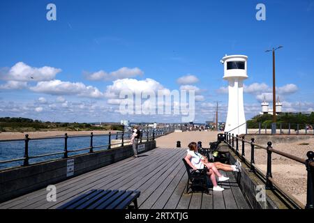 tourists relaxing in littlehampton town seaside resort,west sussex,uk september 14 2023 Stock Photo