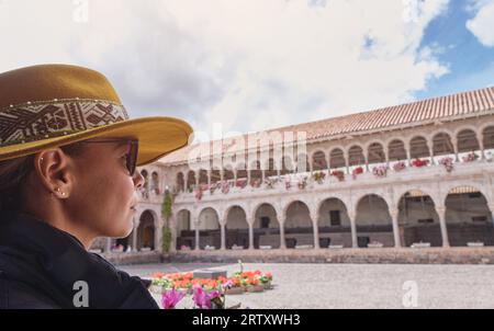 Girl exploring The Temple of the Sun of the Incas or Coricancha, Qorikancha, Cusco, Peru Stock Photo