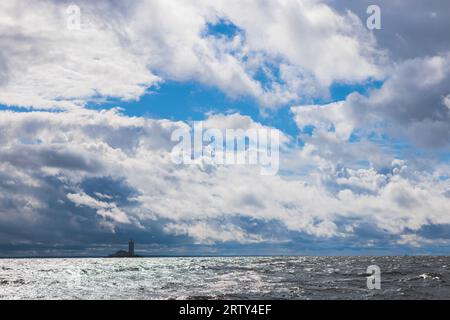 Tolbukhin island lighthouse, Saint-Petersburg, Kronstadt, Gulf of Finland view, Russia in summer sunny day, lighthouses of Russia travel Stock Photo