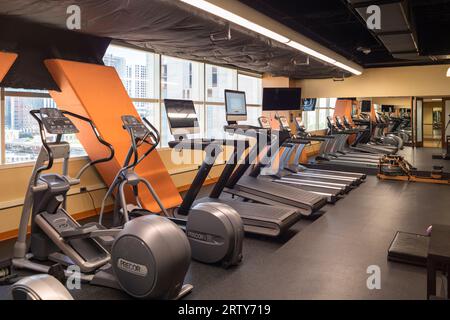 Treadmills in a row in a gym Stock Photo