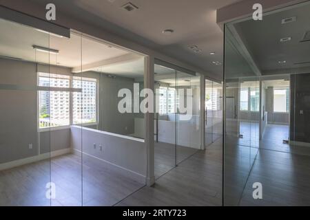 Empty office with glass walls, Miami, Florida, USA Stock Photo