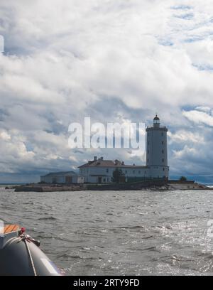 Tolbukhin island lighthouse, Saint-Petersburg, Kronstadt, Gulf of Finland view, Russia in summer sunny day, lighthouses of Russia travel Stock Photo