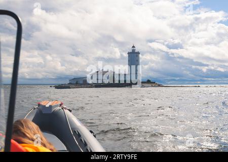 Tolbukhin island lighthouse, Saint-Petersburg, Kronstadt, Gulf of Finland view, Russia in summer sunny day, lighthouses of Russia travel Stock Photo