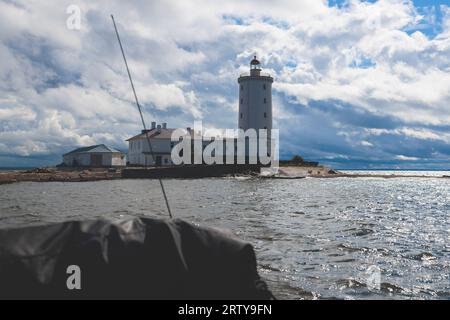 Tolbukhin island lighthouse, Saint-Petersburg, Kronstadt, Gulf of Finland view, Russia in summer sunny day, lighthouses of Russia travel Stock Photo