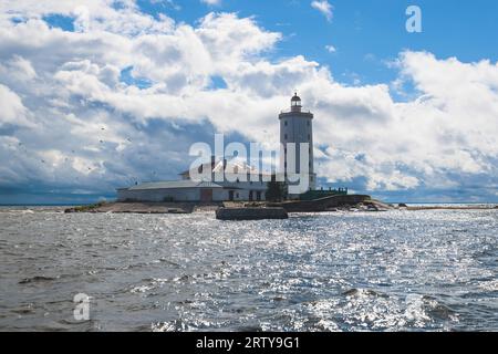 Tolbukhin island lighthouse, Saint-Petersburg, Kronstadt, Gulf of Finland view, Russia in summer sunny day, lighthouses of Russia travel Stock Photo