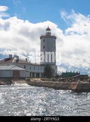 Tolbukhin island lighthouse, Saint-Petersburg, Kronstadt, Gulf of Finland view, Russia in summer sunny day, lighthouses of Russia travel Stock Photo