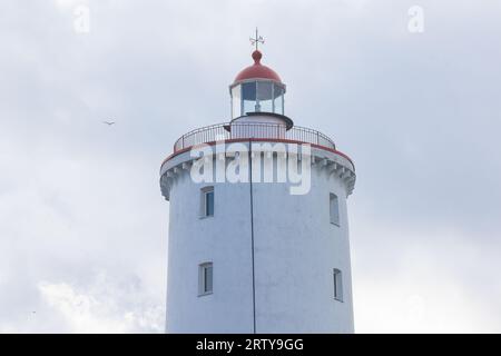 Tolbukhin island lighthouse, Saint-Petersburg, Kronstadt, Gulf of Finland view, Russia in summer sunny day, lighthouses of Russia travel Stock Photo