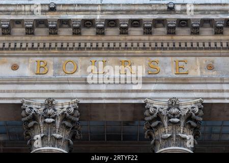 Close-up of the word 'Bourse' written in French on the facade of the Palais Brongniart, a building that previously housed the Paris Stock Exchange Stock Photo