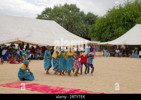 Okombahe: King's Festival of the Damara: Dance group, young women in traditional clothing dancing for the king, Erongo Region, Namibia Stock Photo