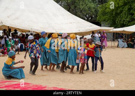 Okombahe: King's Festival of the Damara: Dance group, young women in traditional clothing dancing for the king, Erongo Region, Namibia Stock Photo