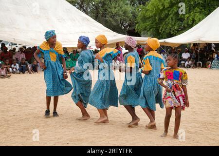 Okombahe: King's Festival of the Damara: Dance group, young women in traditional clothing dancing for the king, Erongo Region, Namibia Stock Photo