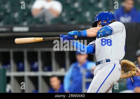 Kansas City Royals catcher Logan Porter walks between fields