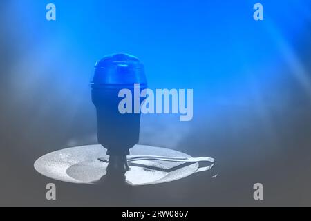 Hookah head bowl smoking object in grey dark blue light close-up. Stock Photo