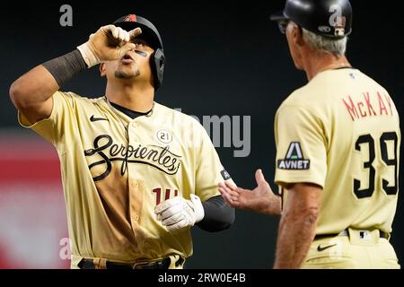 Arizona Diamondbacks' Gabriel Moreno hits against the Milwaukee Brewers  during the fourth inning of a baseball game, Monday, April 10, 2023, in  Phoenix. (AP Photo/Matt York Stock Photo - Alamy