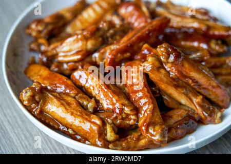 A delicious Chinese home-cooked dish, Braised Chicken Wings in Sauce Stock Photo