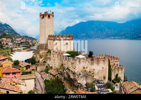 Scaliger Castle or Castello Scaligero is a medieval fortress in the Malcesine old town on the shore of Lake Garda in Verona province, Italy Stock Photo