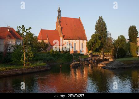 Poland, Bydgoszcz, St. Martin Nicholas Cathedral on the Brda River Stock Photo