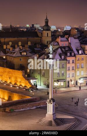 Old Town of Warsaw in Poland by night, King Sigismund III Vasa Column on Castle Square Stock Photo