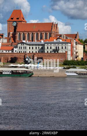 City of Torun in Poland, medieval Old Town by Vistula river with Cathedral Basilica of St. John the Baptist and St. John the Evangelist Stock Photo