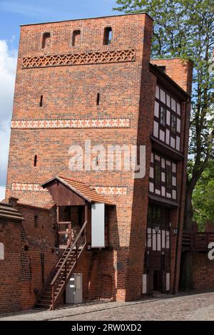 The Leaning Tower in Torun, Poland, part of the medieval city wall fortification from 14th century Stock Photo