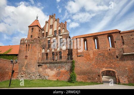 Citizen Court, sentry tower and city wall in Torun, Poland, former summer residence of the Brotherhood of St. George, medieval Gothic architecture Stock Photo