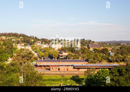 A view over Castlemaine CBD and station from the Gaol on a warm evening Stock Photo