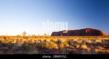 Majestic Uluru at sunrise on a clear winter#39, s morning in the Northern Territory, Australia Stock Photo